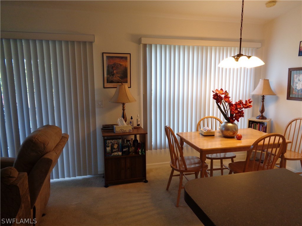 2512 53rd Street West Lehigh Acres, FL 33971 - Photo 11 of 25 a view of a livingroom and dining room