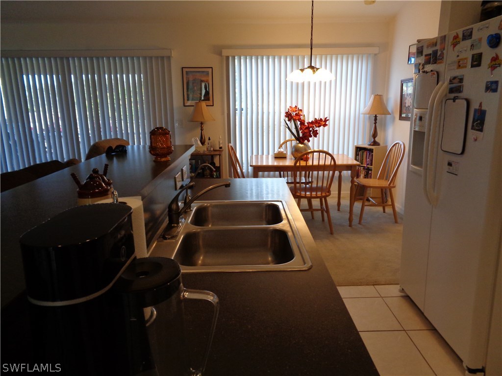 2512 53rd Street West Lehigh Acres, FL 33971 - Photo 13 of 25 a room with gym equipment and windows
