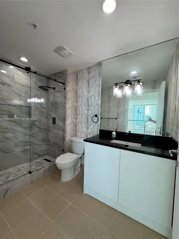 a bathroom with a sink and a toilet