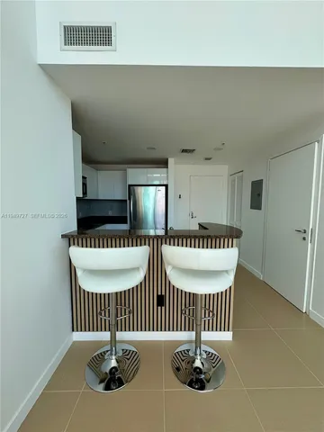 a view of a livingroom with furniture