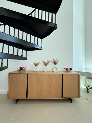 a bed room with a bed and a window