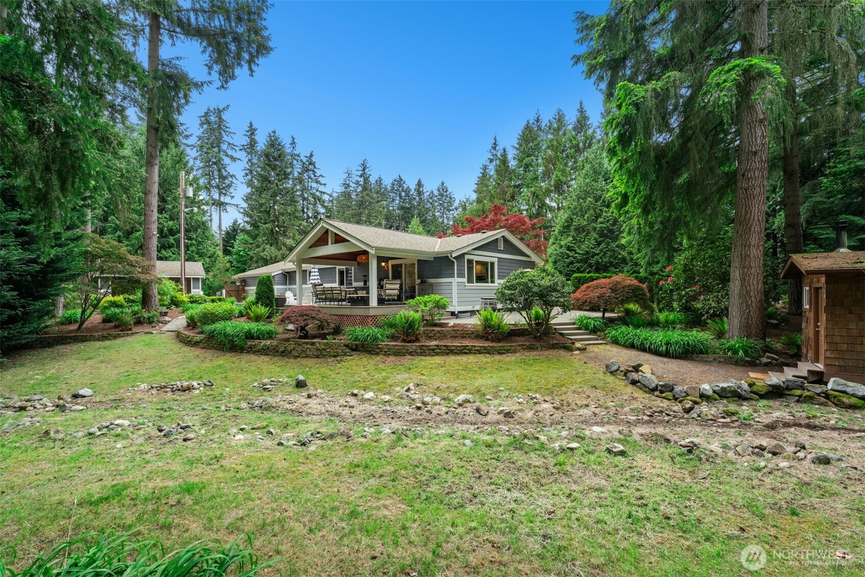 23307 49th Avenue Southeast Bothell, WA 98021 - Photo 27 of 37 a front view of a house with garden