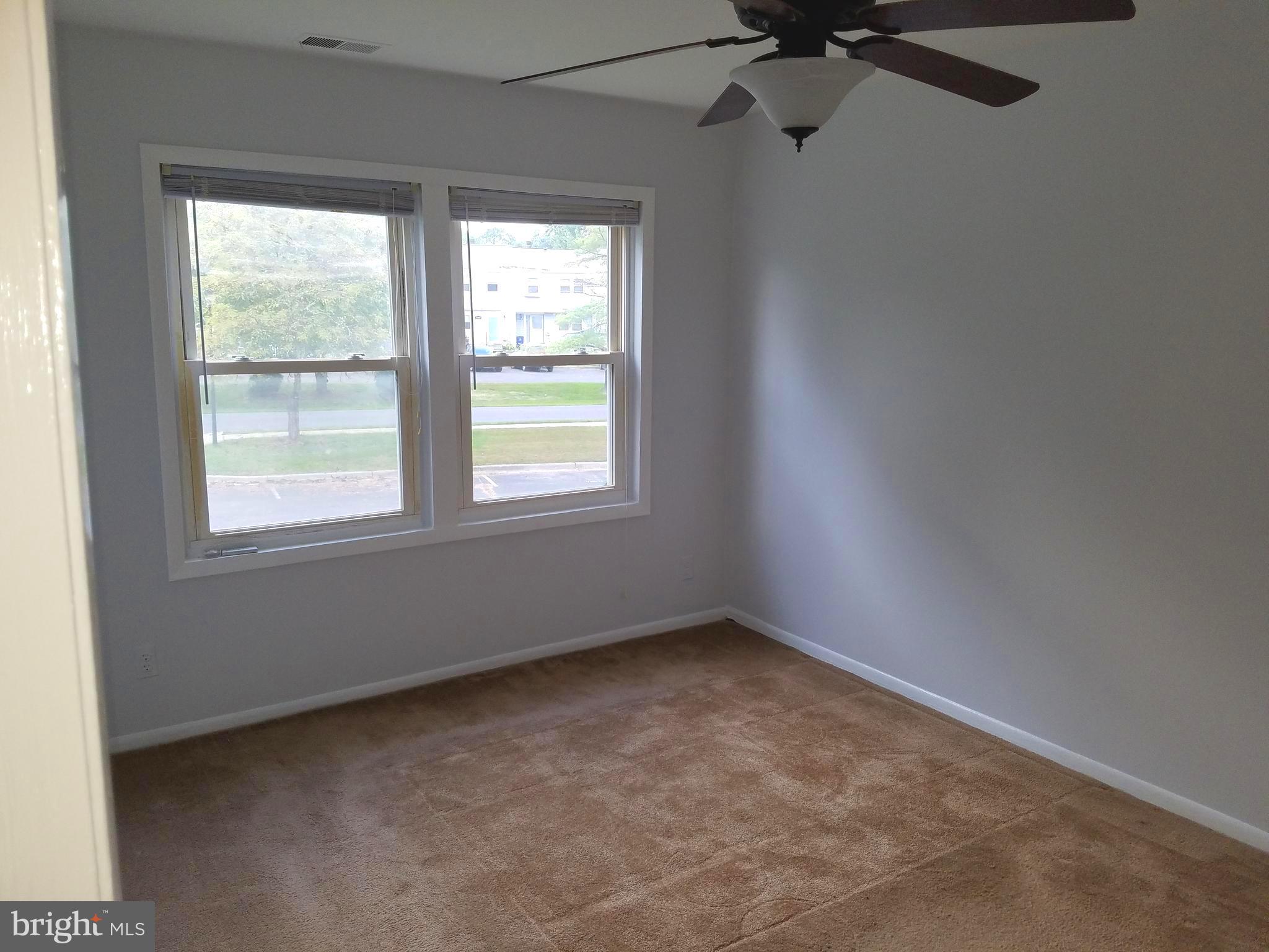17433 Hughes Road Poolesville, MD 20837 - Photo 11 of 20 an empty room with a window