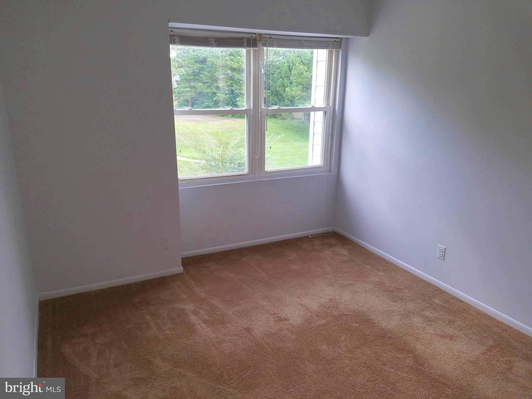 17433 Hughes Road Poolesville, MD 20837 - Photo 16 of 20 an empty room with a window