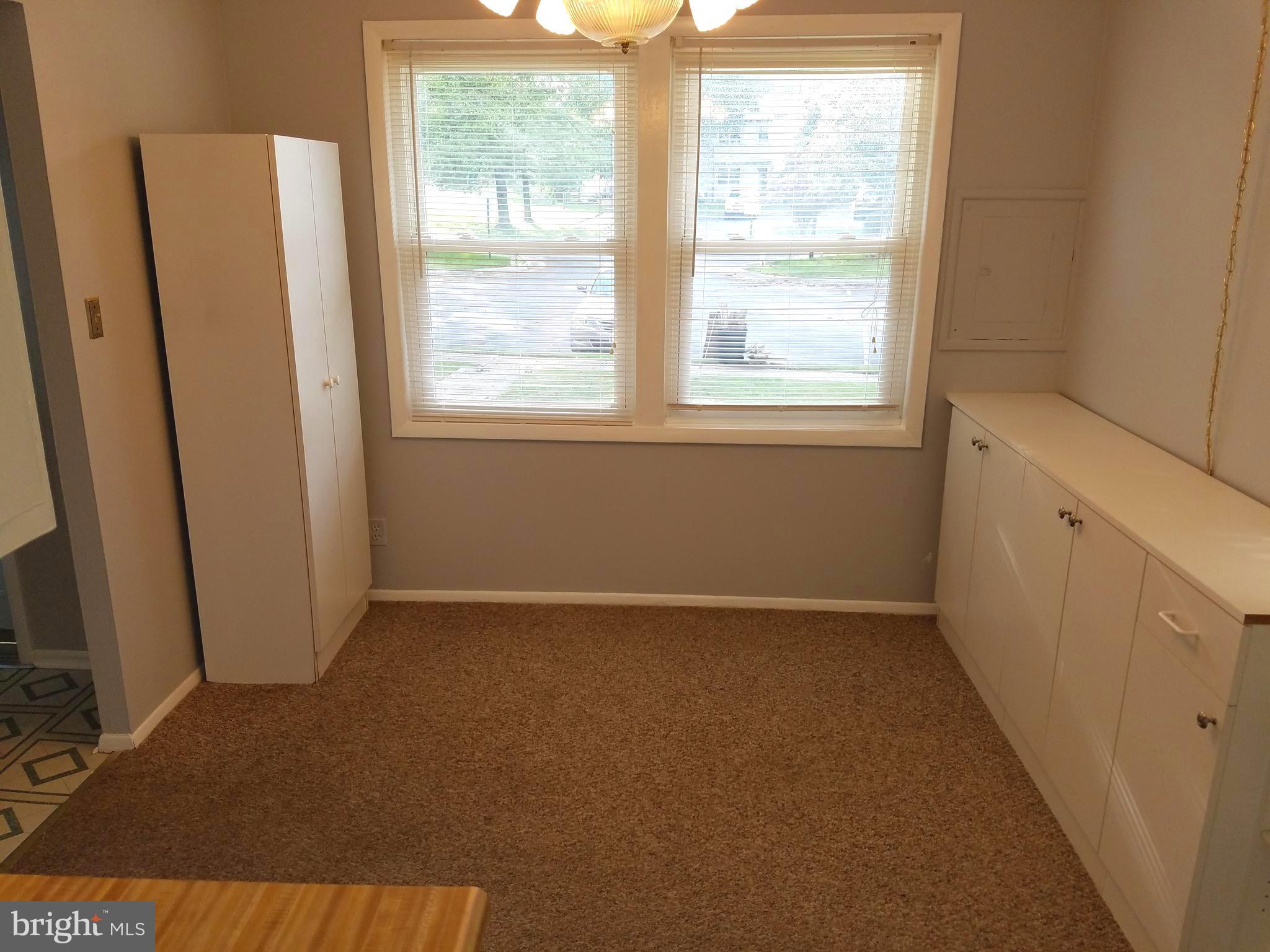 17433 Hughes Road Poolesville, MD 20837 - Photo 8 of 20 a view of an empty room with a window