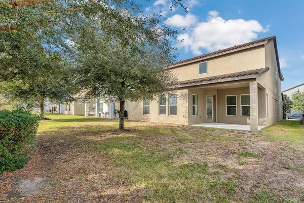 a view of a house with a swimming pool