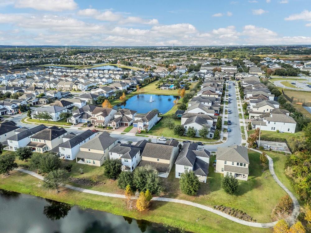 12880 Westside Vlg Loop Windermere, FL 34786 - Photo 36 of 42 an aerial view of residential houses with outdoor space and river