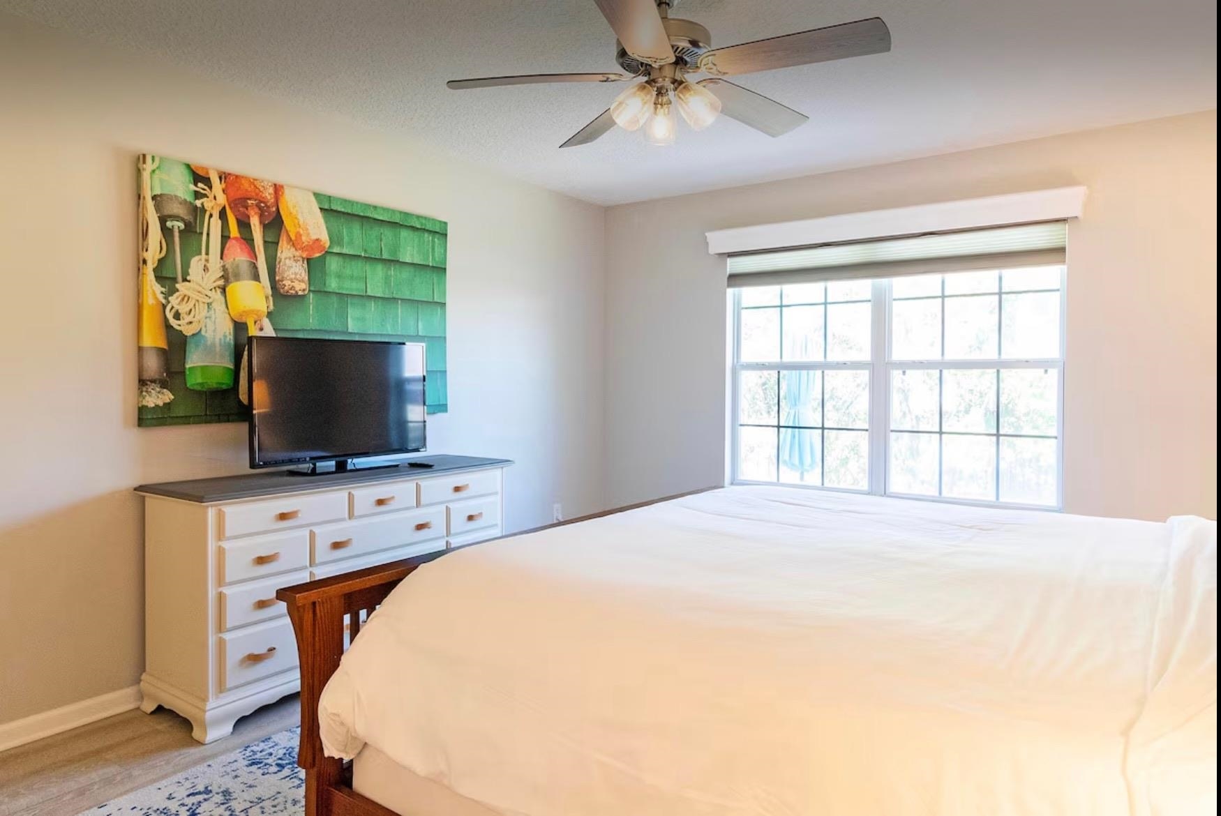 5340 4th Street St. Augustine, FL 32080 - Photo 13 of 29 a bedroom with a bed and a flat screen tv