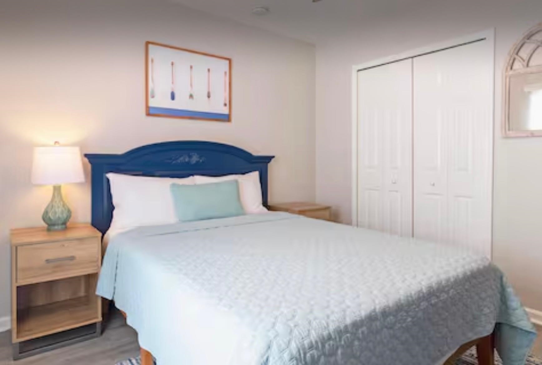 5340 4th Street St. Augustine, FL 32080 - Photo 15 of 29 a bedroom with a bed and a painting on the wall