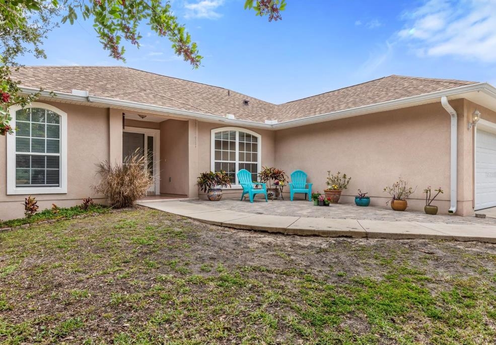 5340 4th Street St. Augustine, FL 32080 - Photo 2 of 29 a view of a house with a patio