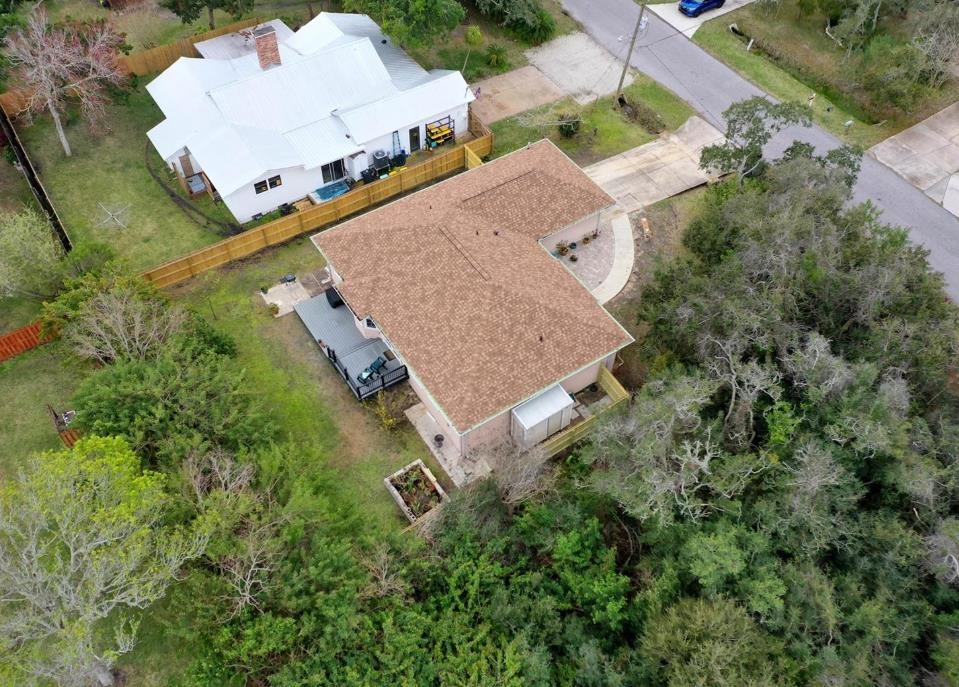 5340 4th Street St. Augustine, FL 32080 - Photo 26 of 29 an aerial view of a house with yard and swimming pool