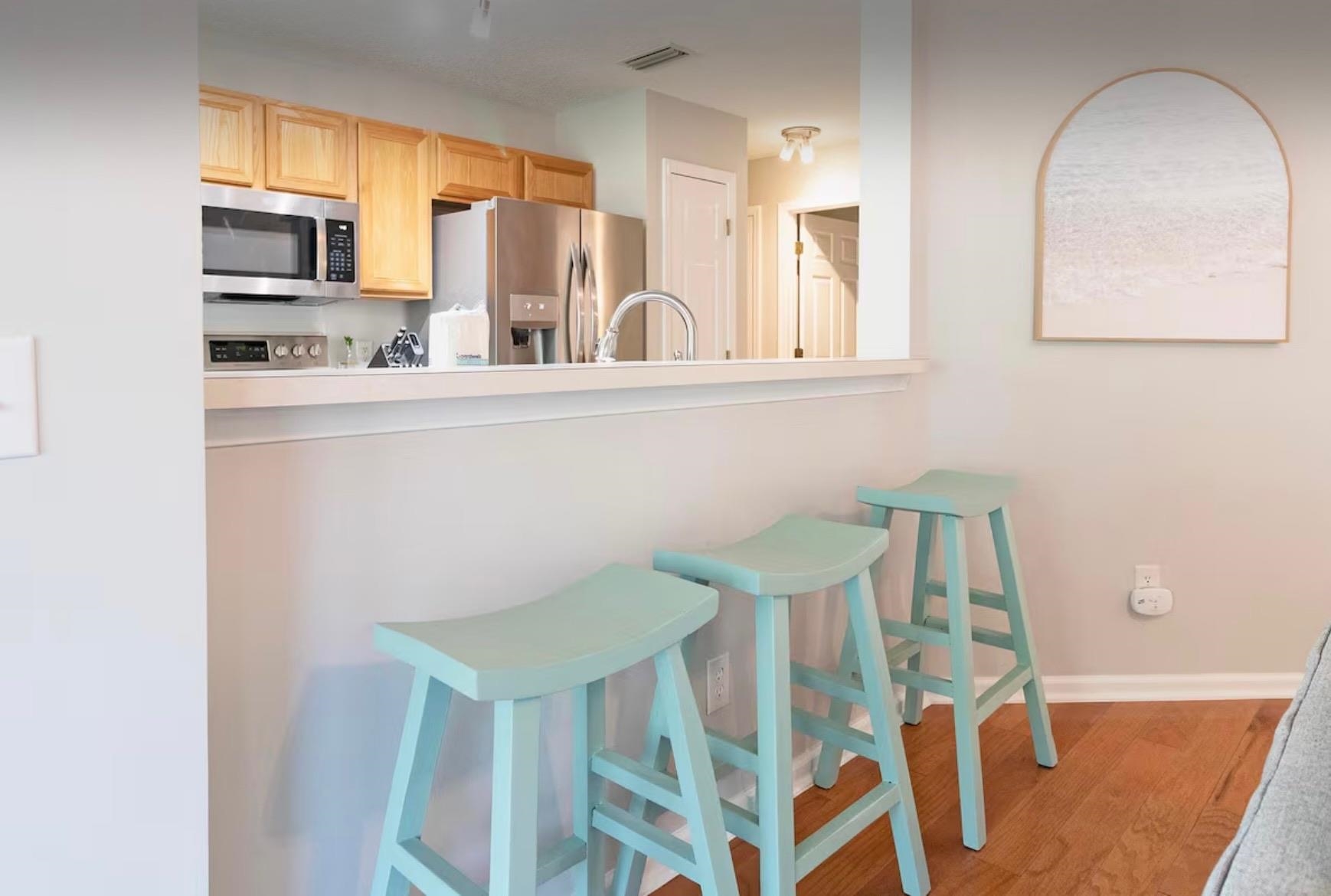 5340 4th Street St. Augustine, FL 32080 - Photo 6 of 29 a kitchen with dining table and chairs