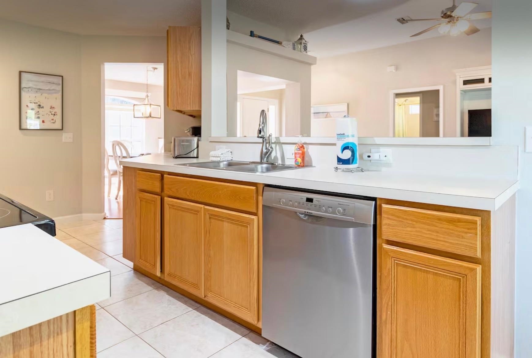 5340 4th Street St. Augustine, FL 32080 - Photo 10 of 29 a kitchen with stainless steel appliances a sink stove and a refrigerator