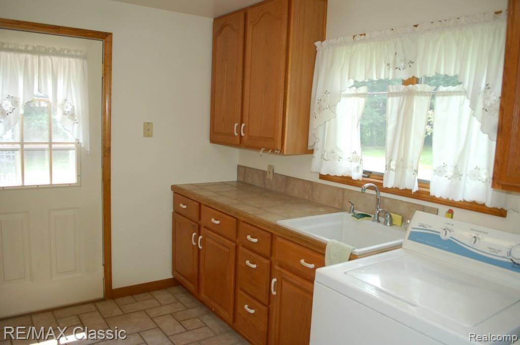 9745 North Eston Road Clarkston, MI 48348 - Photo 15 of 53 LAUNDRY ON FIRST FLOOR