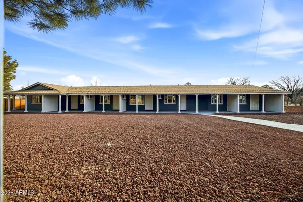 a front view of a house with a balcony