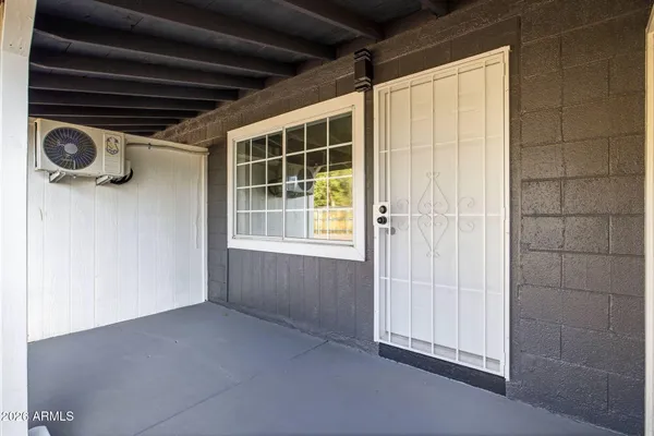 a view of empty room with windows