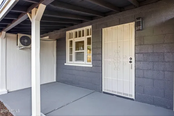 a view of a big room with wooden floor and closet