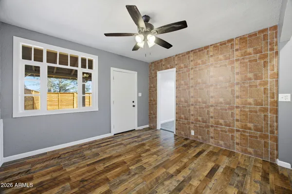 a view of an empty room with a window