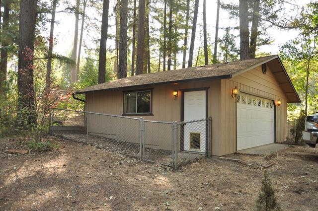 4417 Fish Hatchery Road Grants Pass, OR 97527 - Photo 3 of 16 the yard area to the side and behind the garage is fenced