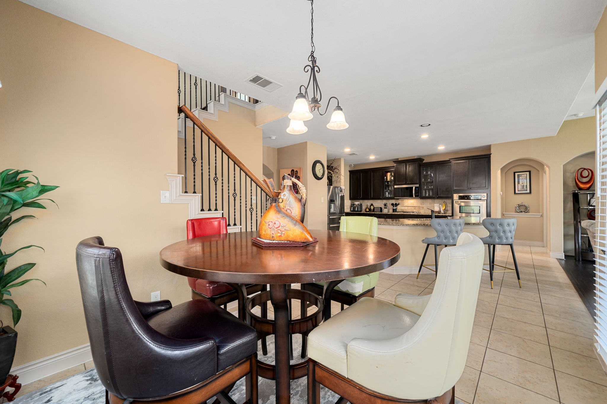 5110 Ruby Rock Way Richmond, TX 77407 - Photo 15 of 27 a dining room with furniture and wooden floor