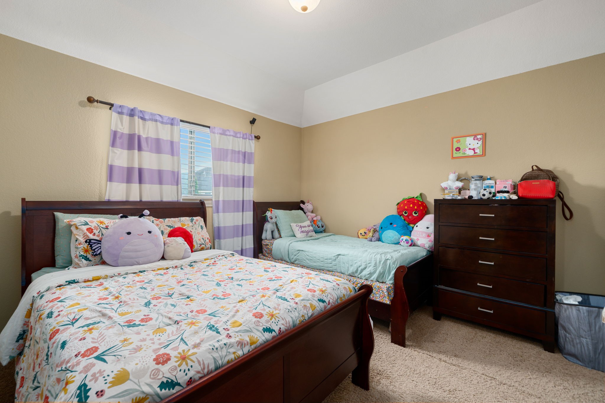 5110 Ruby Rock Way Richmond, TX 77407 - Photo 22 of 27 a bedroom with a bed and cabinets