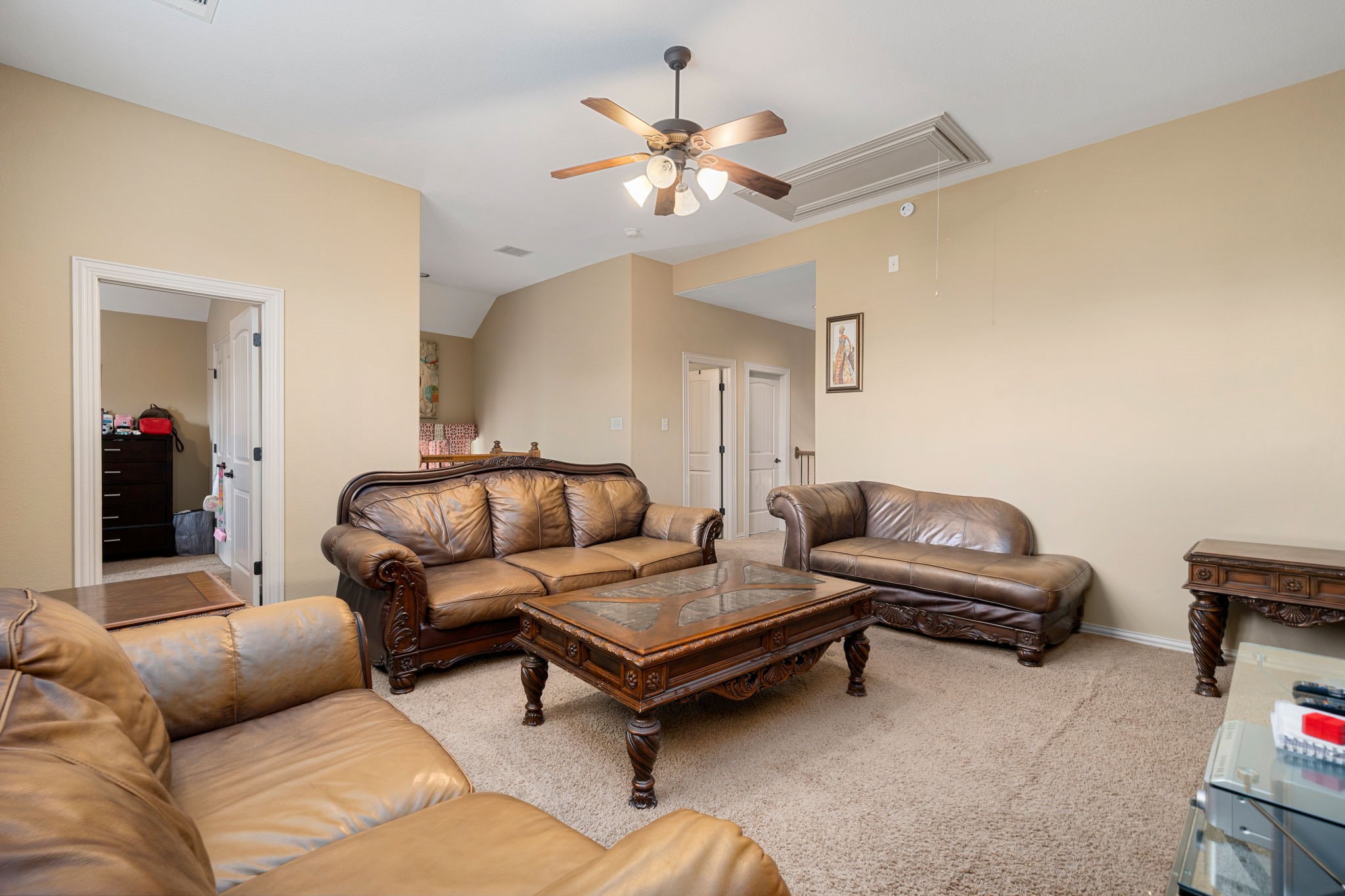 5110 Ruby Rock Way Richmond, TX 77407 - Photo 24 of 27 a living room with furniture and a ceiling fan