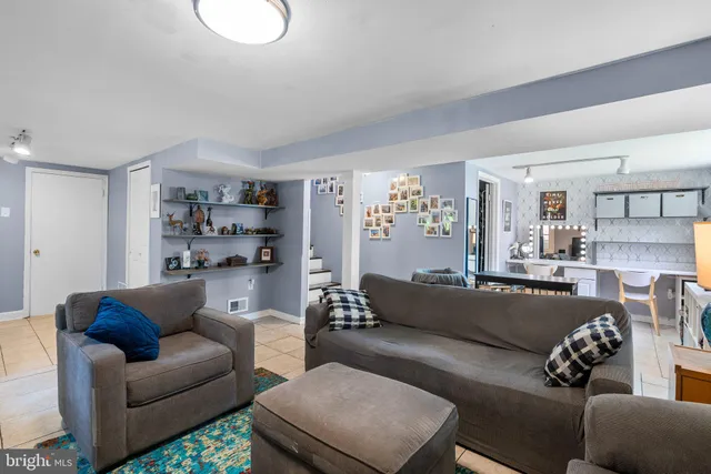 a living room with furniture and a couch