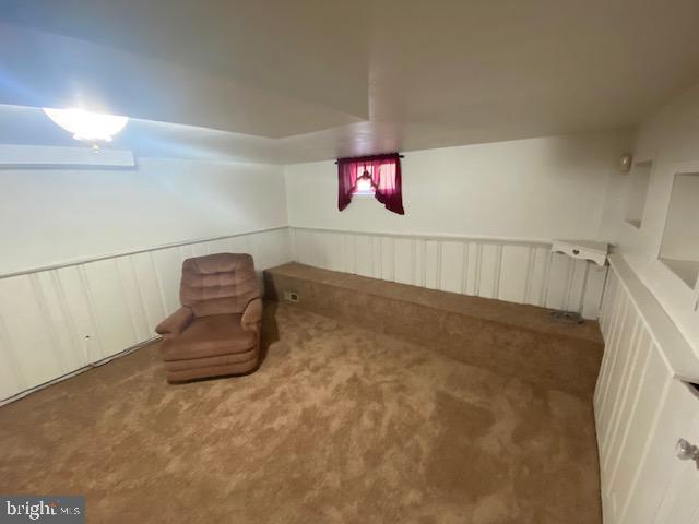 5905 Jamestown Road Hyattsville, MD 20782 - Photo 13 of 25 a view of a room with rack on the wall