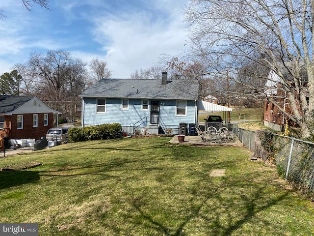 5905 Jamestown Road Hyattsville, MD 20782 - Photo 23 of 25 a front view of a house with swimming pool having outdoor seating