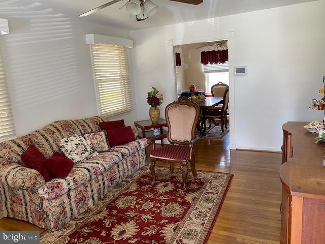 5905 Jamestown Road Hyattsville, MD 20782 - Photo 6 of 25 a living room with furniture and a window
