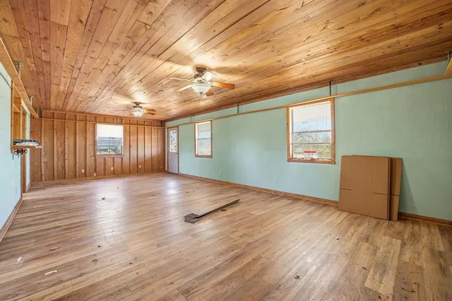 a view of livingroom with hardwood floor and hallway