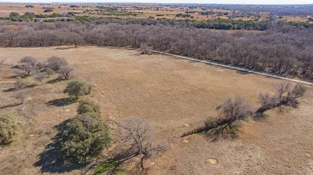a view of a dry yard covered with fog