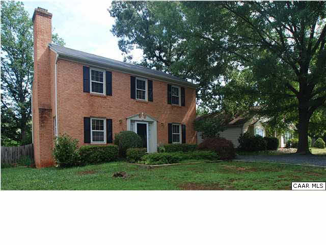 385 Minor Ridge Road Charlottesville, VA 22901 - Photo 2 of 15 a view front of brick house with a yard