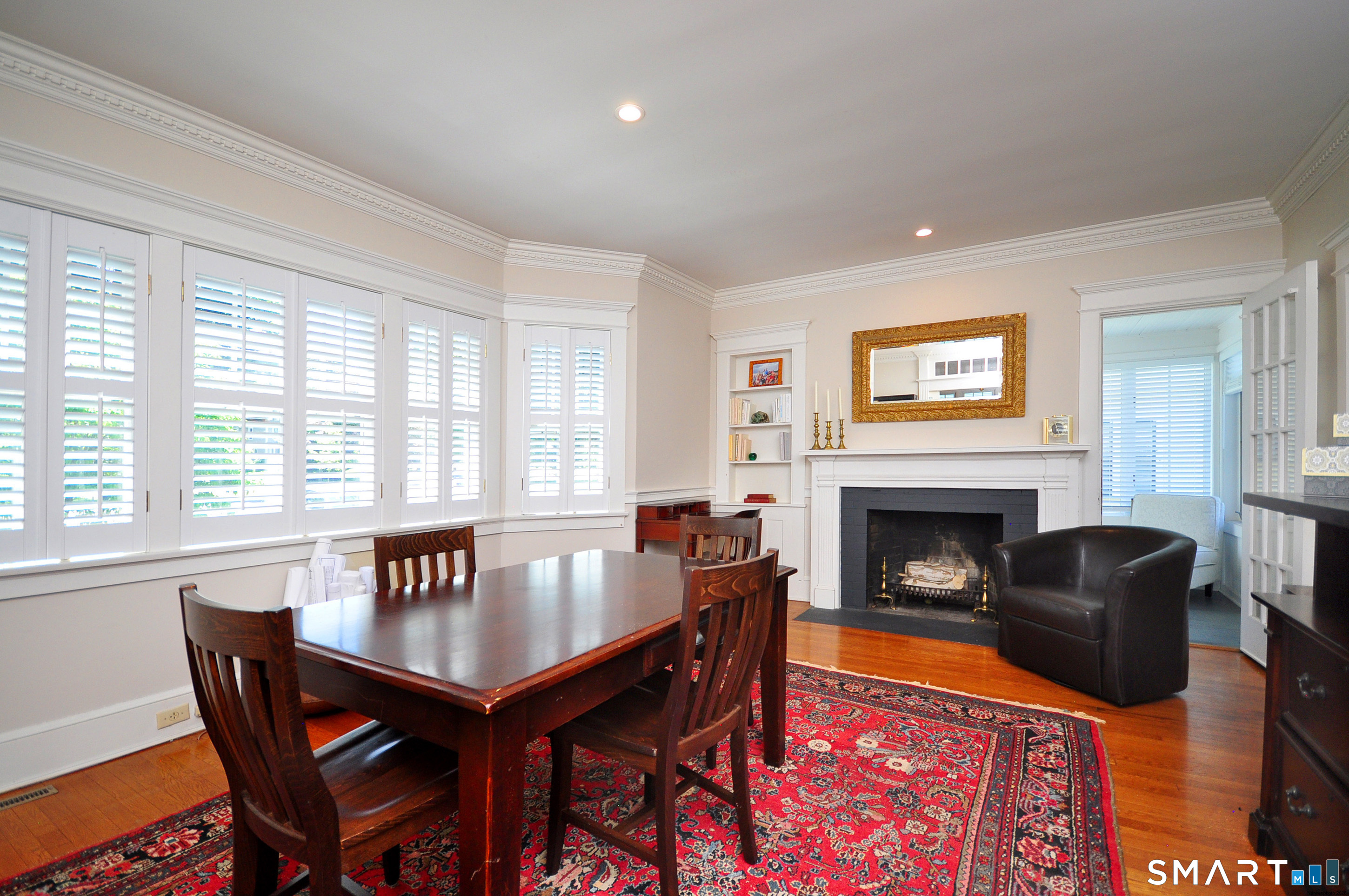 371 North Main Street Suffield, CT 06078 - Photo 16 of 39 a living room with furniture and a fireplace
