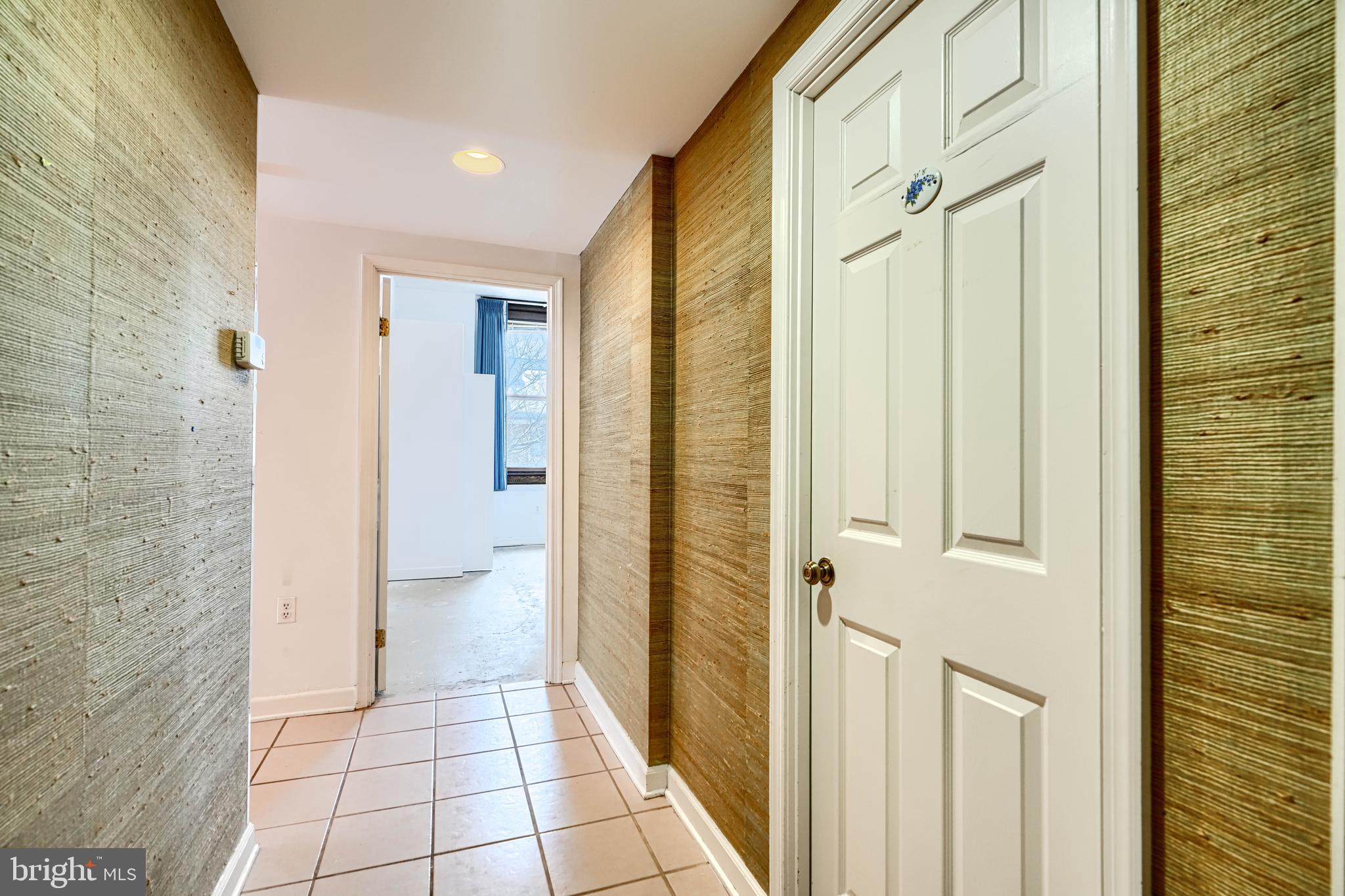5712 Roland Avenue, Unit 1E Baltimore, MD 21210 - Photo 2 of 39 a view of a bathroom with a shower