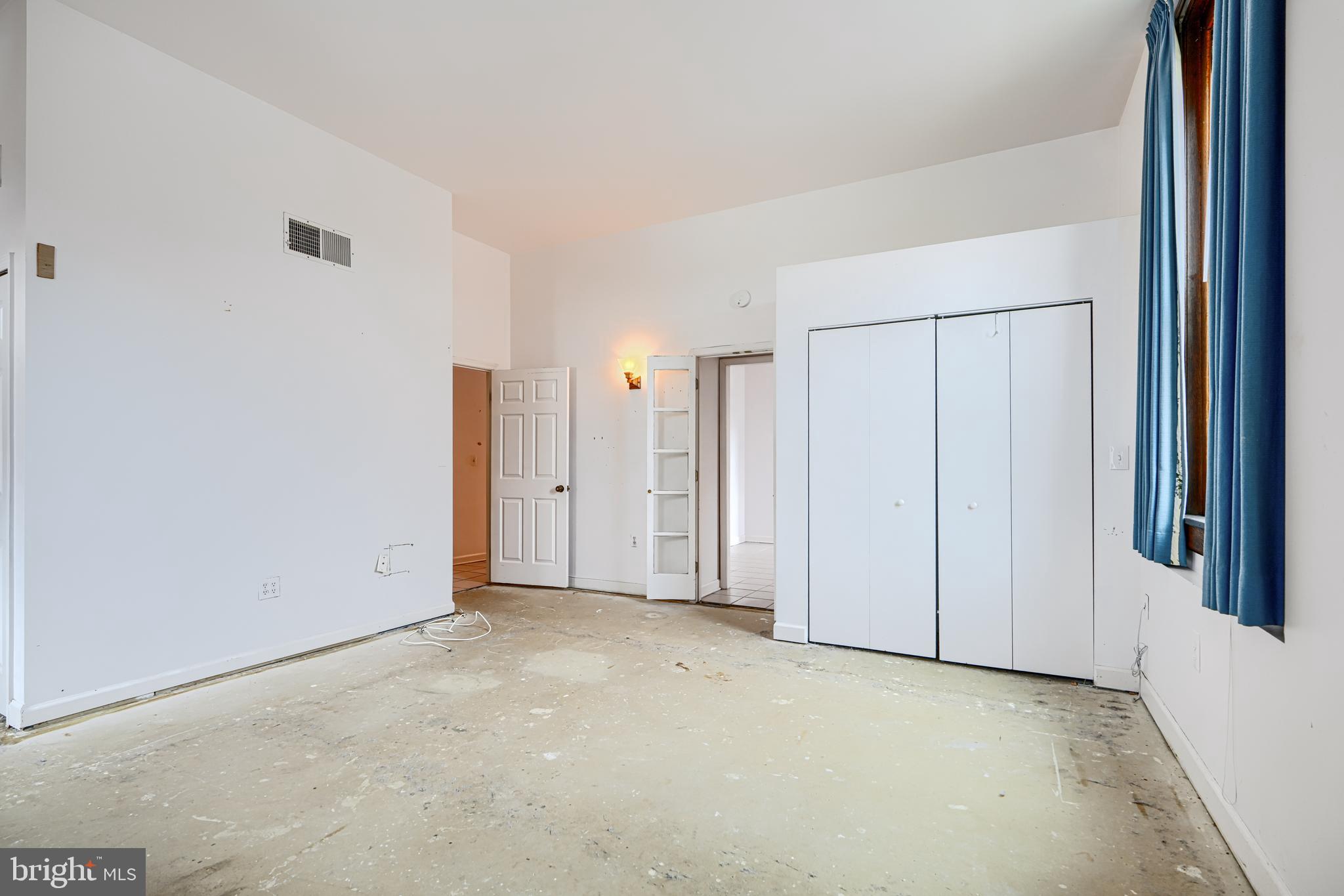 5712 Roland Avenue, Unit 1E Baltimore, MD 21210 - Photo 22 of 39 a view of an empty room