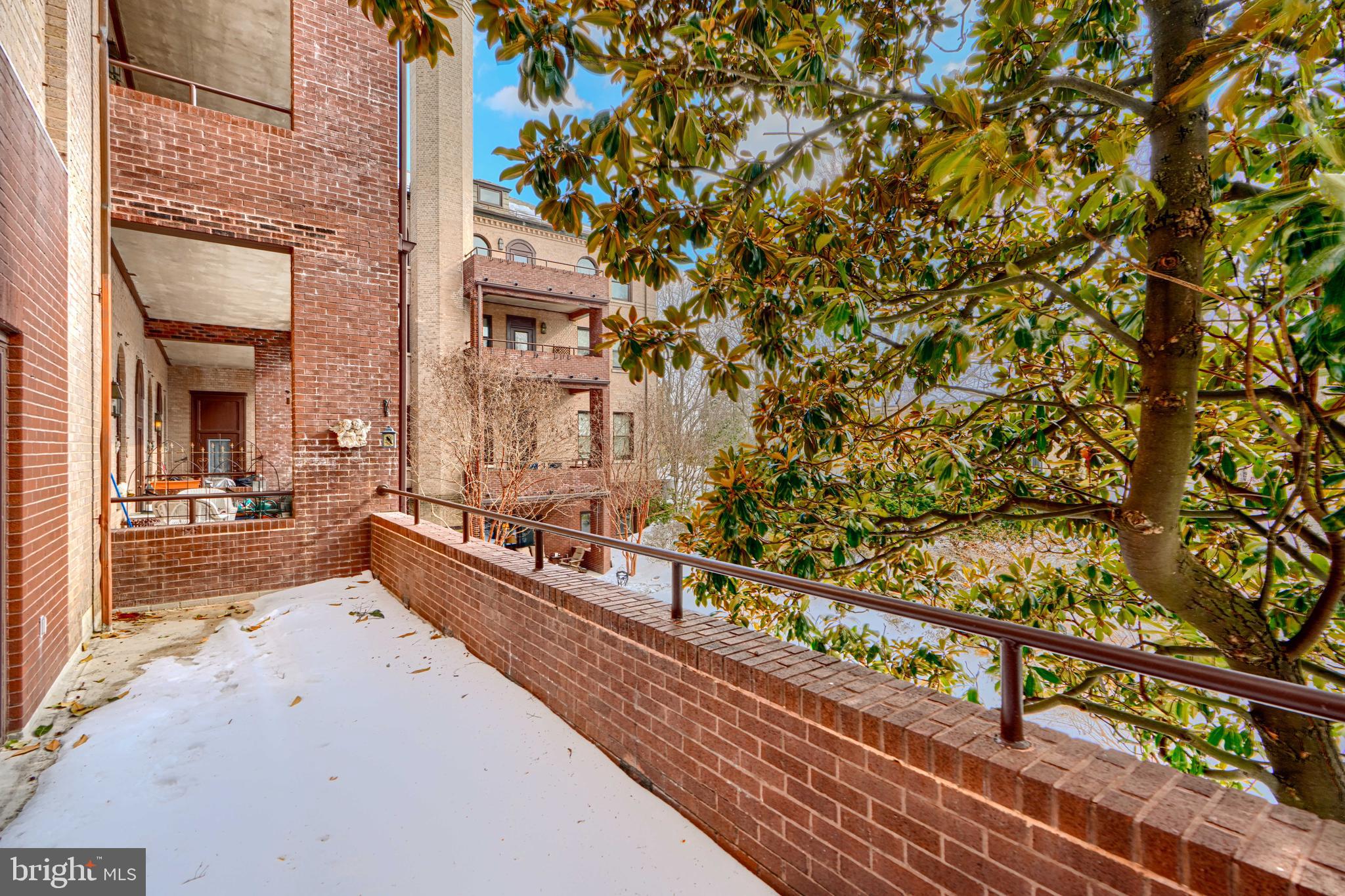 5712 Roland Avenue, Unit 1E Baltimore, MD 21210 - Photo 34 of 39 a view of a balcony with chairs