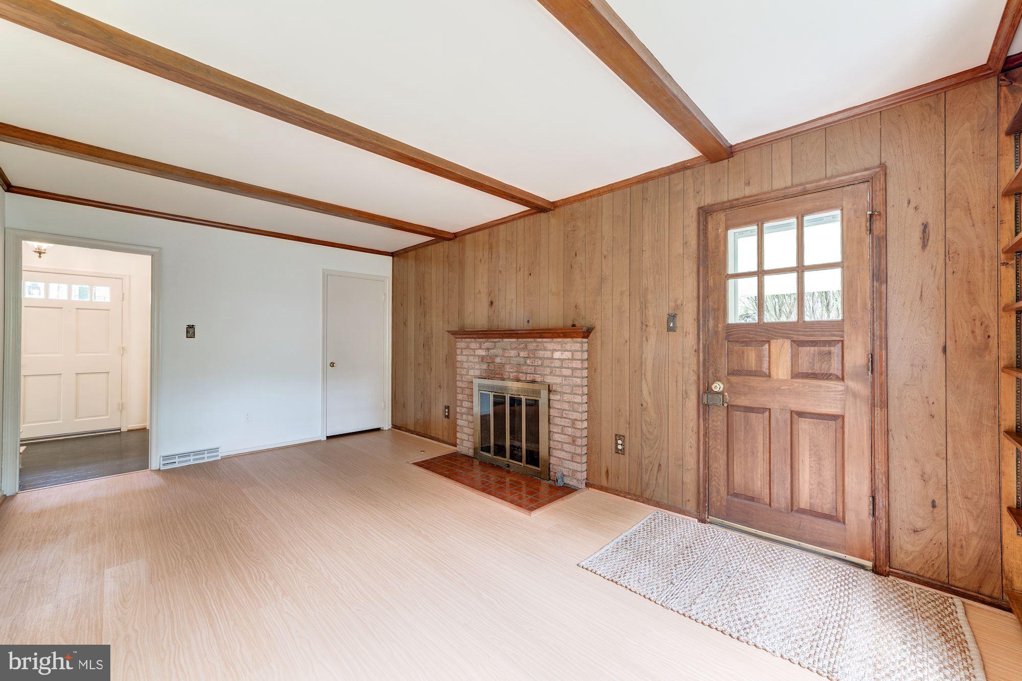 9518 Rockport Road Vienna, VA 22180 - Photo 10 of 27 Den with gas fireplace and new floors