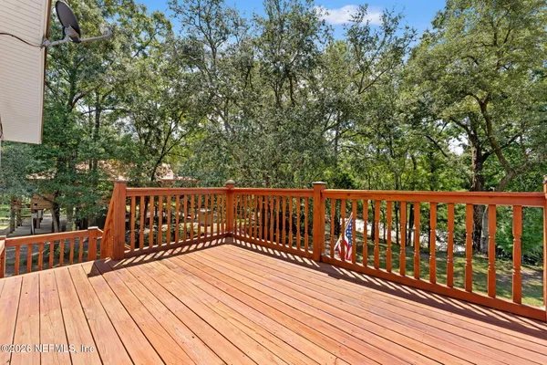 a house with swimming pool in front of it