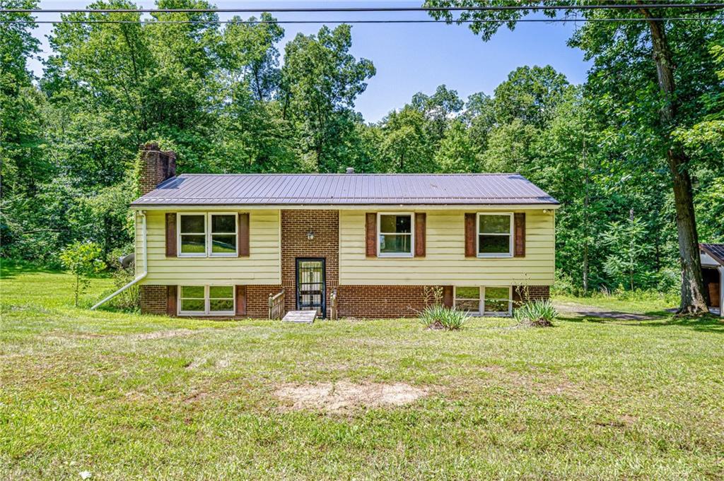 1124 Hemlock Road Indiana, PA 15701 - Photo 1 of 29 a front view of a house with a yard