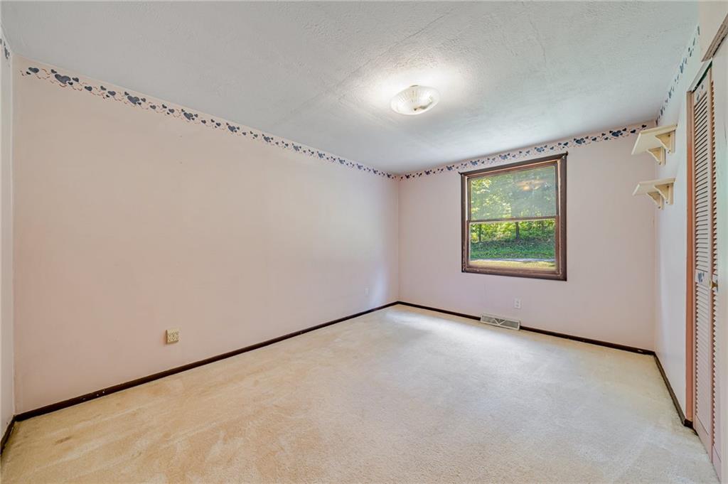 1124 Hemlock Road Indiana, PA 15701 - Photo 15 of 29 a view of an empty room with a window