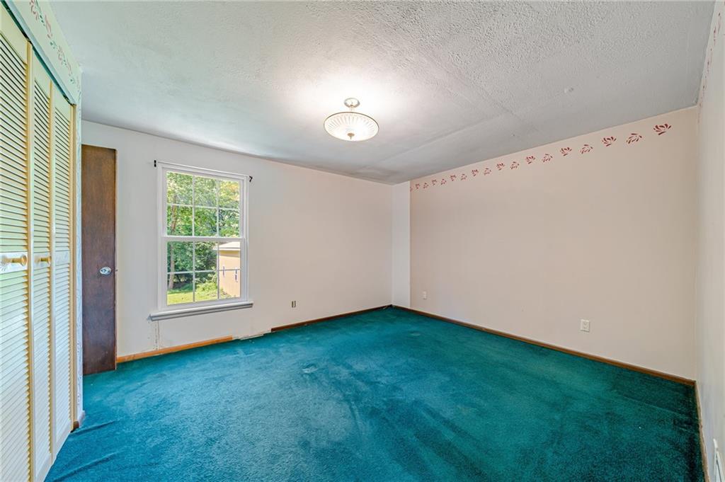 1124 Hemlock Road Indiana, PA 15701 - Photo 17 of 29 an empty room with windows