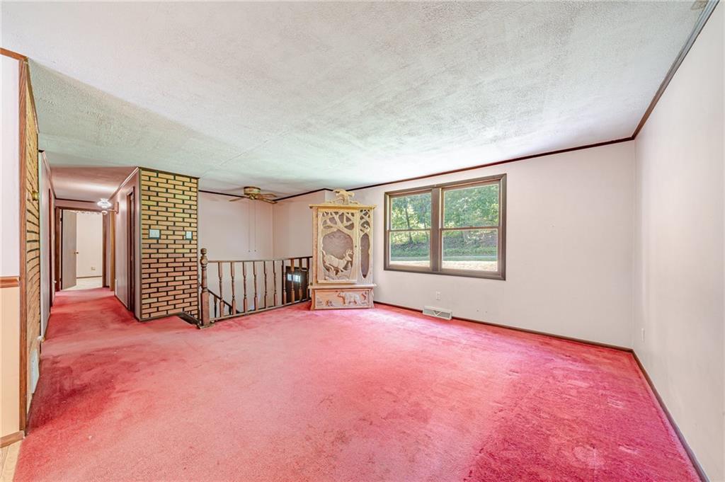 1124 Hemlock Road Indiana, PA 15701 - Photo 4 of 29 an empty room with windows