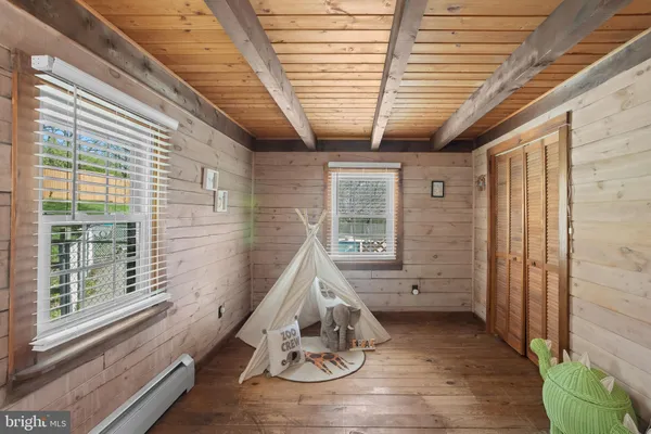 a view of a porch with furniture