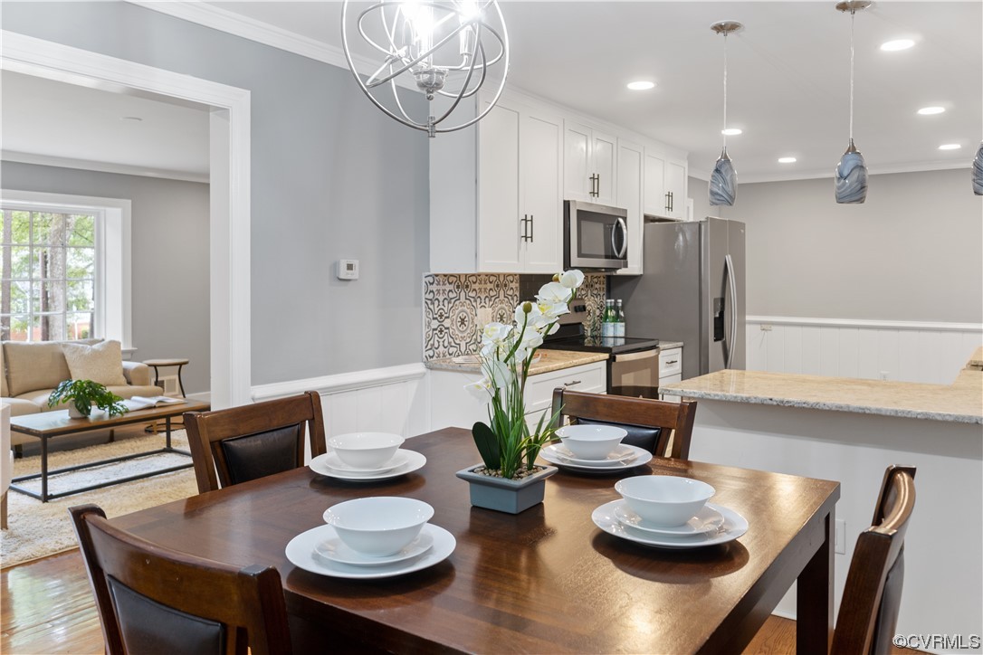 10240 Apache Road Richmond, VA 23235 - Photo 15 of 45 a view of a dining room with furniture