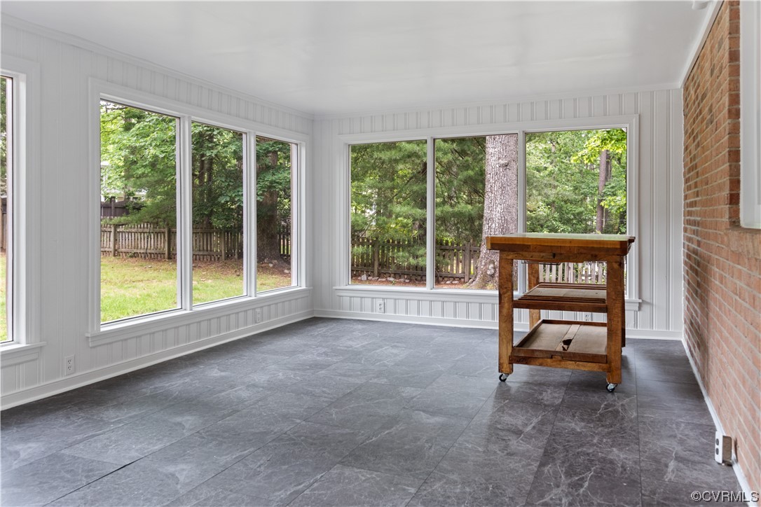 10240 Apache Road Richmond, VA 23235 - Photo 18 of 45 a view of an empty room with a large window