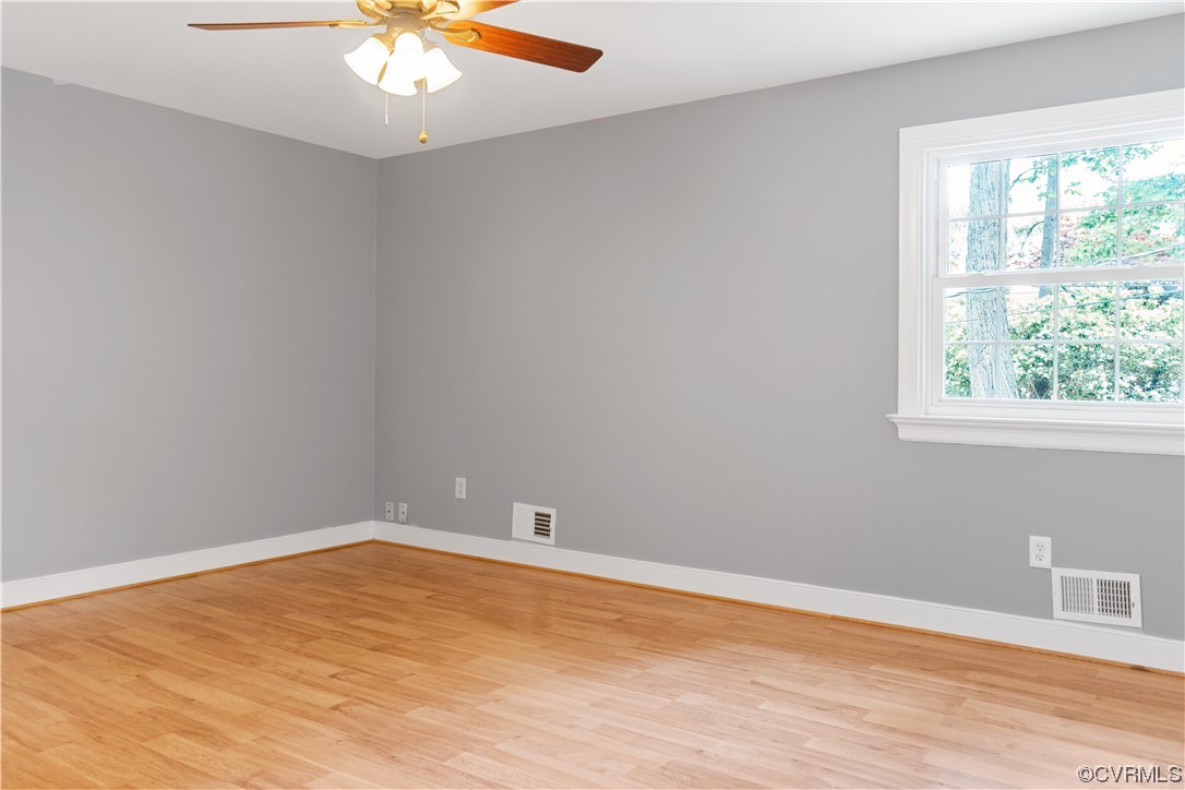 10240 Apache Road Richmond, VA 23235 - Photo 22 of 45 an empty room with a window