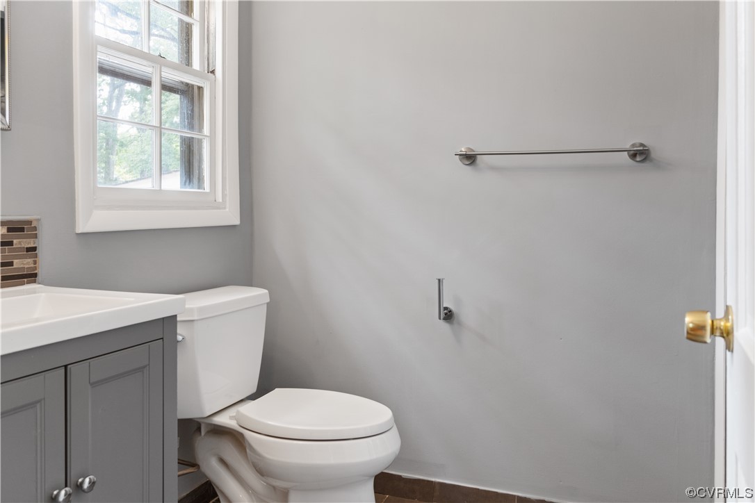 10240 Apache Road Richmond, VA 23235 - Photo 23 of 45 a bathroom with a toilet and a sink