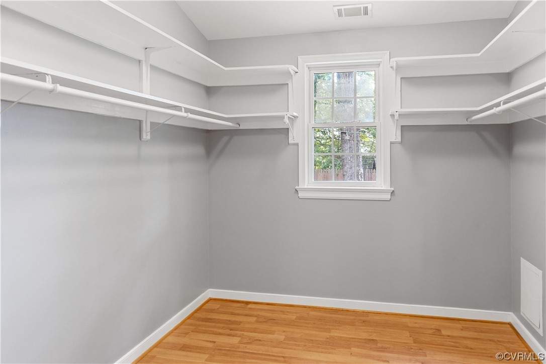 10240 Apache Road Richmond, VA 23235 - Photo 31 of 45 a view of a room with rack on the wall and a window