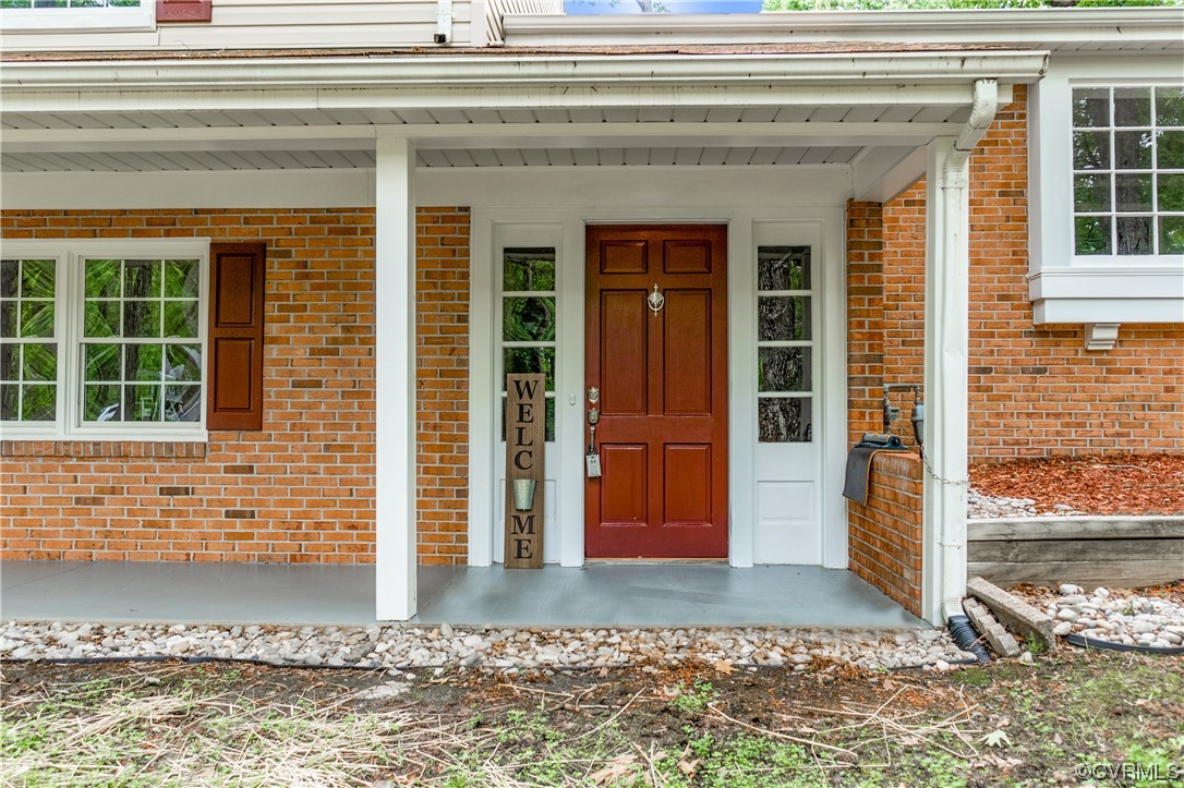 10240 Apache Road Richmond, VA 23235 - Photo 5 of 45 a view of front door of house